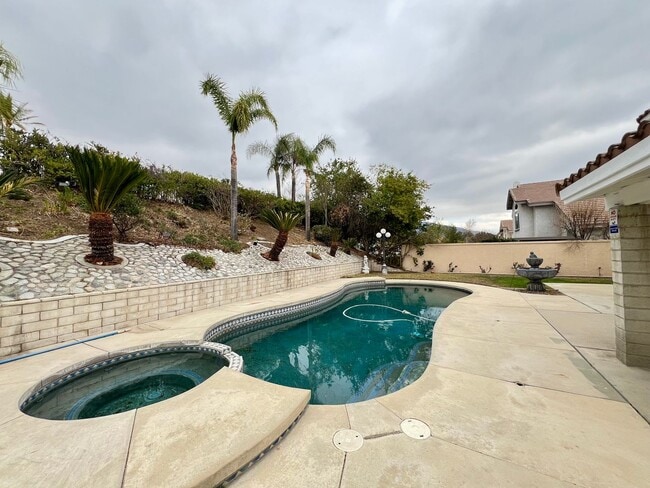 Building Photo - Beautiful 4 Bedroom Single Family Home with Pool and Pool Service Included for Lease in Rancho Cu...