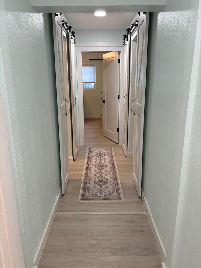 Building Photo - 7705 Poinsetta Ave