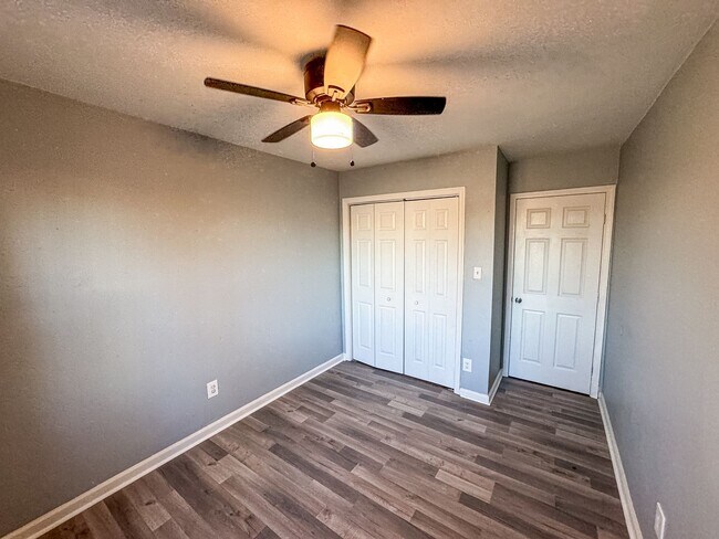 Building Photo - Introducing our spacious townhouse located...