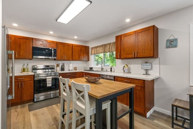 Building Photo - Secluded Forest Retreat | Full Kitchen, AC, W/D