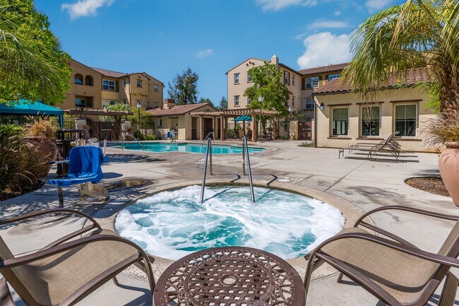 Building Photo - Paseos At Magnolia Luxury Apartments Homes