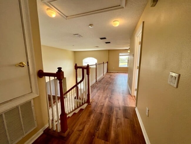 Building Photo - EAGLE CREEK LAKE NONA! WELCOME HOME! Beautiful water views! Spacious 2 story-3 bedroom 2.5 bath h...