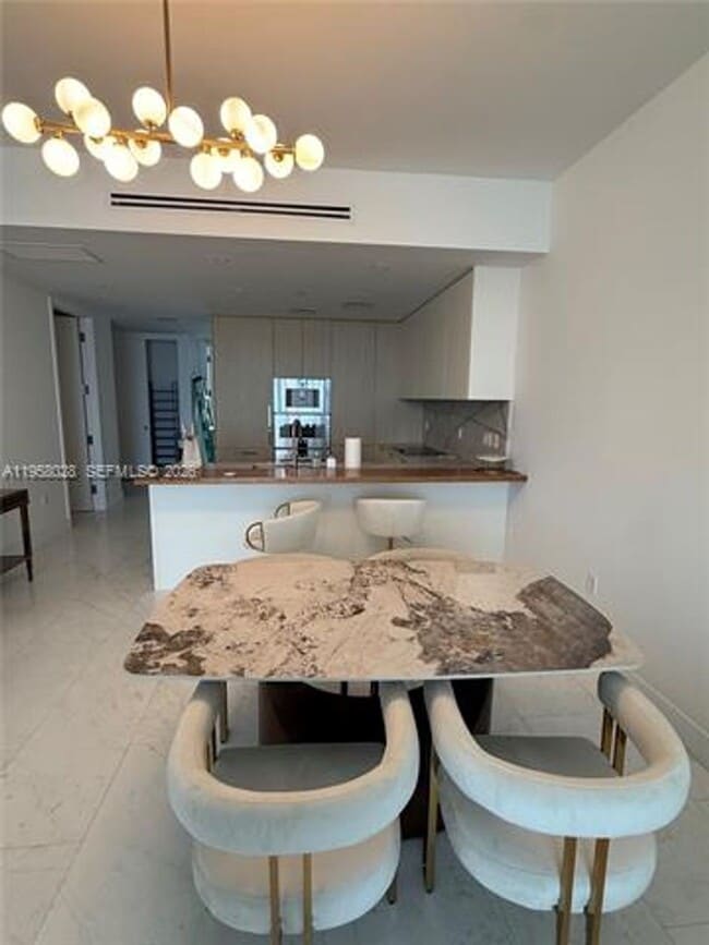 Building Photo - 15701 Collins Ave