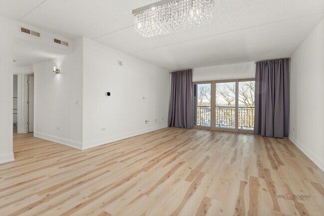 Building Photo - 8727 W Bryn Mawr Ave