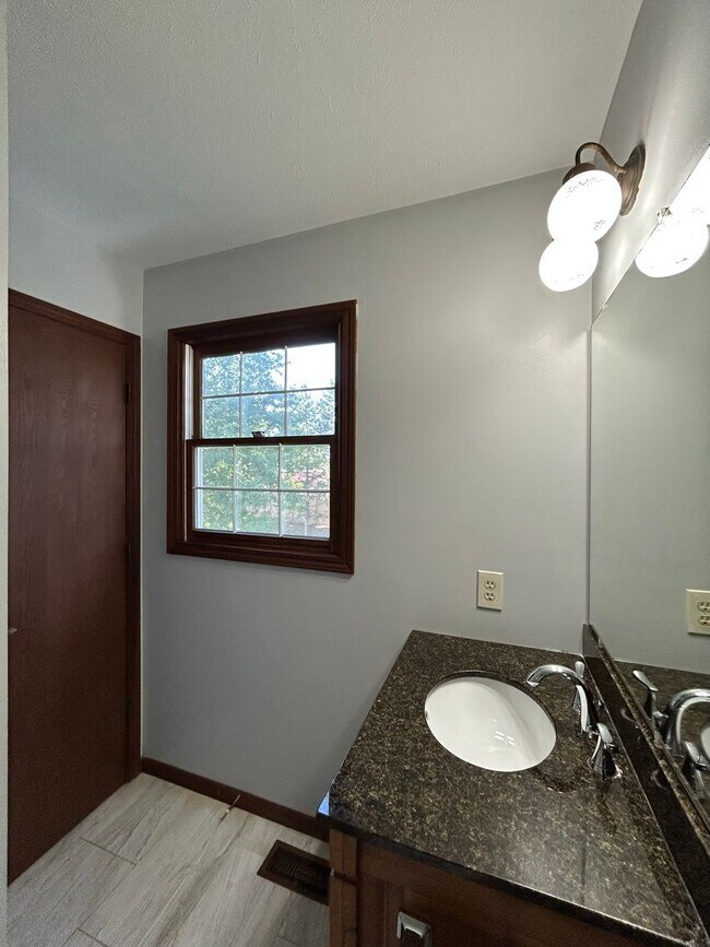 Building Photo - 3 Bedroom Stone Facade Colonial with 2 Car Attached Garage  in Strongsville