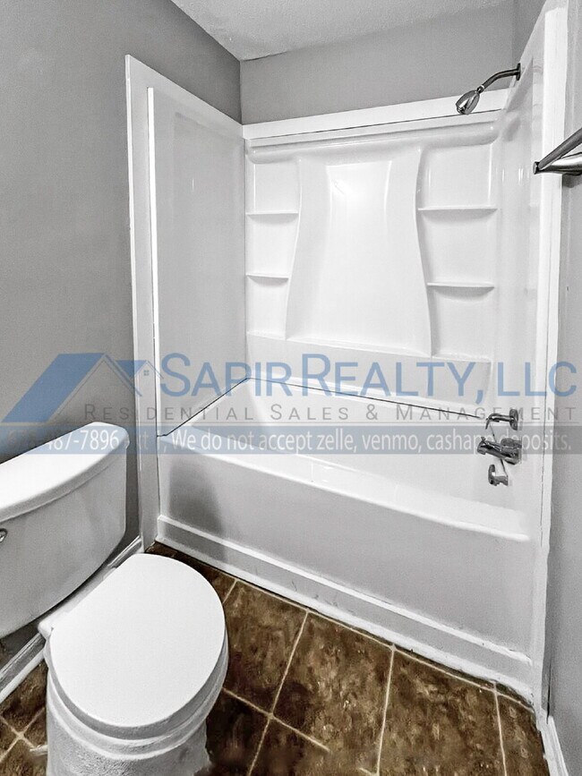 Building Photo - Move in before December 31st and choose your reward: a $250 Amazon Gift Card or a 55" Smart TV!