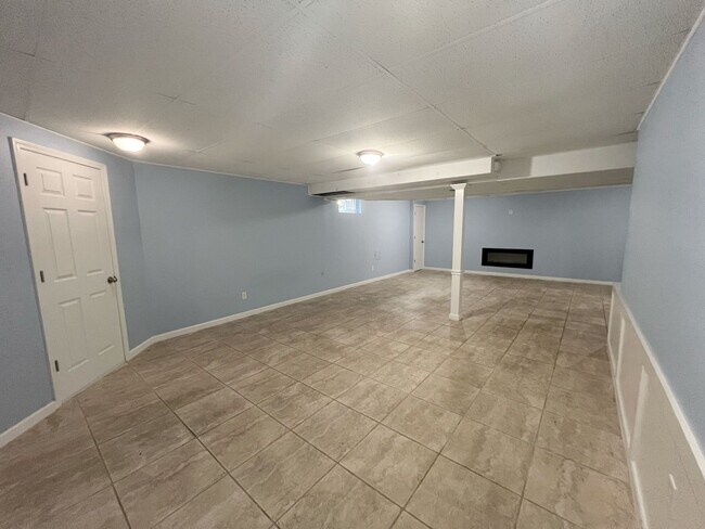 Building Photo - SEE IT NOW: Spacious 4-Bed Home with Finis...