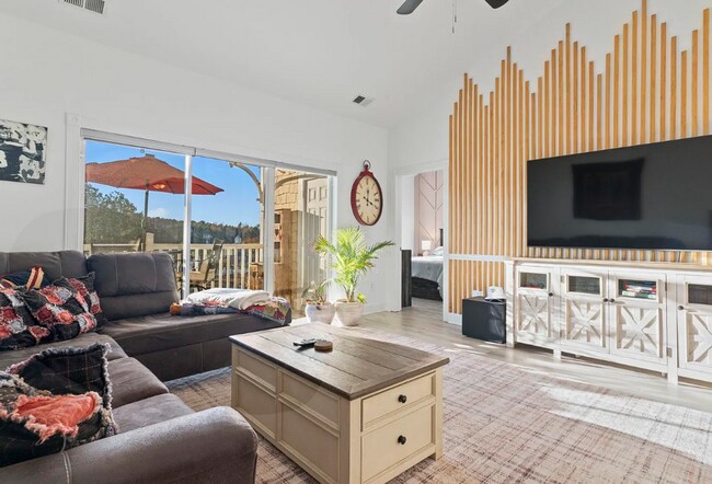 Building Photo - Stunning Top-Floor 2-Bedroom Retreat with Serene Pond Views!