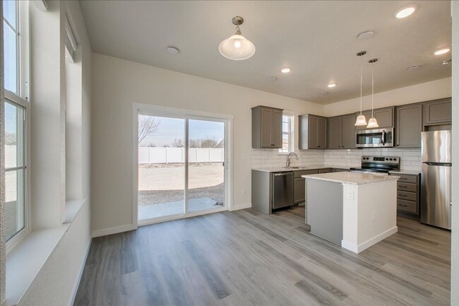 Building Photo - Two Story Townhome Located Off Of Amity & Five Mile!