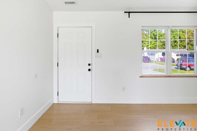 Building Photo - Beautiful Like-New 3 Bedroom Home with Huge Fenced Yard, Greenhouse & Storage