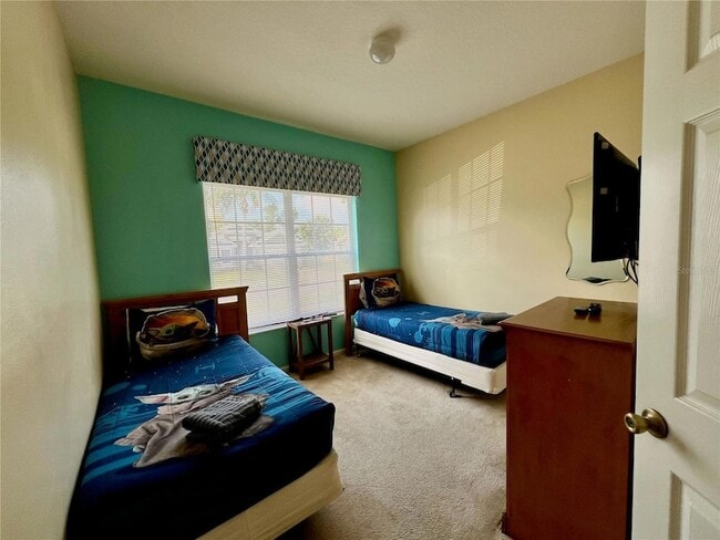 Building Photo - 8127 Fan Palm Way