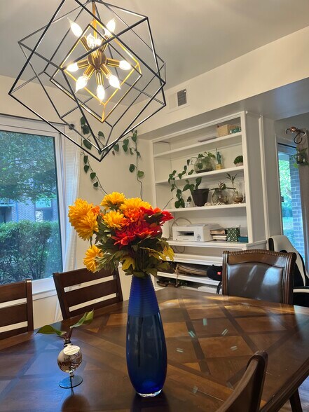 dinning room with built in bookshelf - 9705 Kings Crown Ct