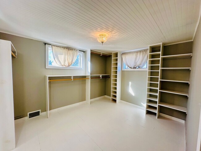 Building Photo - {8520} Charming Four Bedroom in Fantastic Location + Two Main Floor Bedrooms + Hardwood Floors + ...