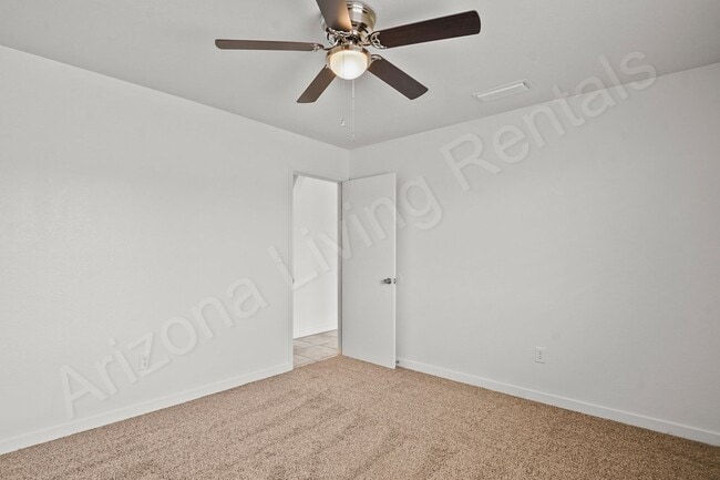 Building Photo - 2699 Smoketree Ave N