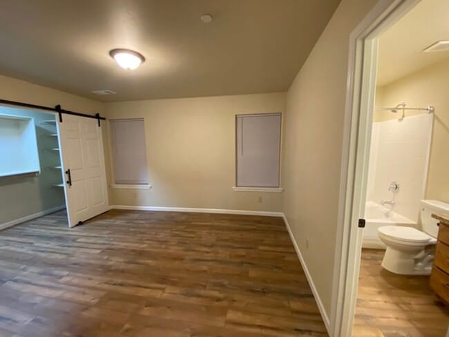 Building Photo - Simply gorgeous 3/2 with 2 car garage, dog...