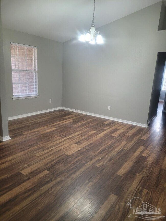 Building Photo - 5863 Chi Chi Cir