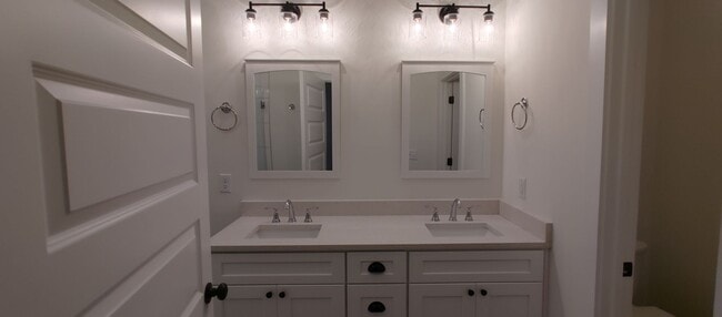 Building Photo - 5-bedroom home with 3 car garage and fully...