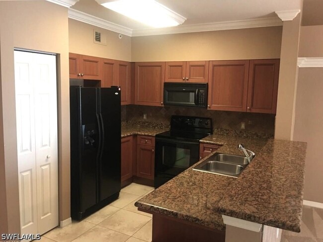 Building Photo - 10101 Villagio Palms Way