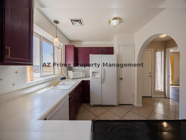 Building Photo - 7040 W Olive Ave