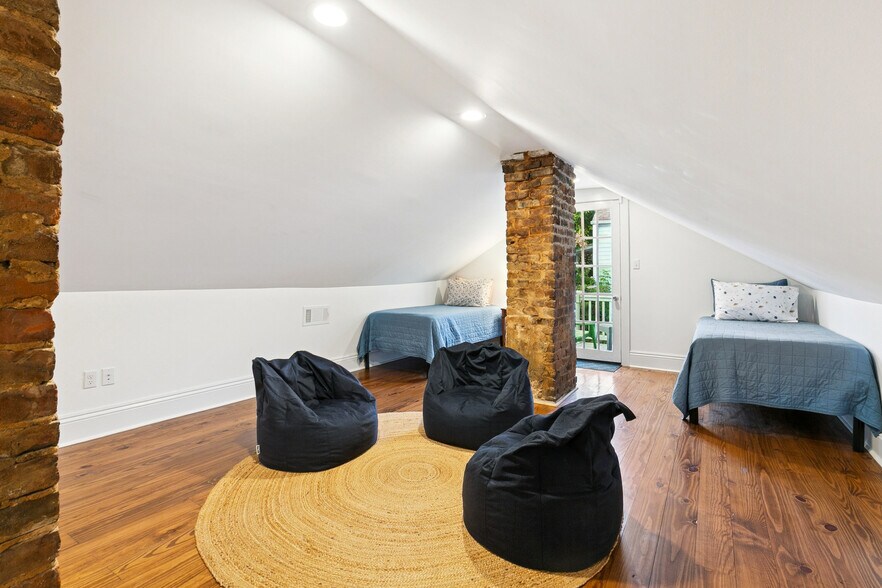 upstairs bedroom, 2 twin beds, bean bag chairs, private balcony access - 2337 N Rampart St