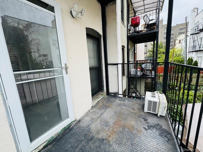 Building Photo - 25-38-38 22nd St