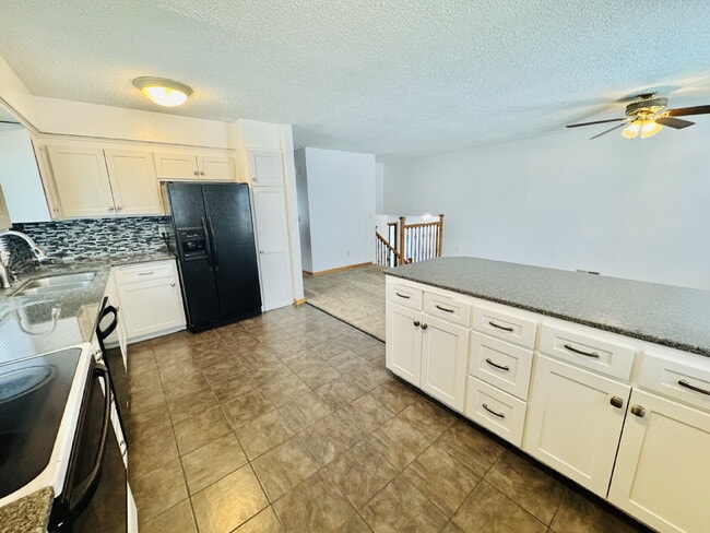 Building Photo - Single Family Home with 4-Bedrooms and 2 bathrooms in Coon Rapids