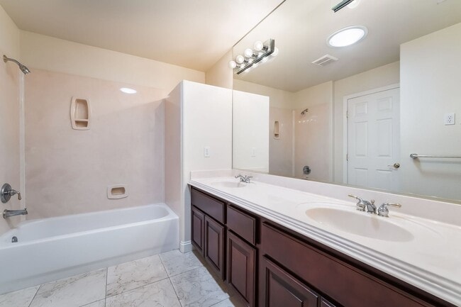 Building Photo - Beautiful Three Story, Five Bedroom Home with Lagoon Style Pool and Spa