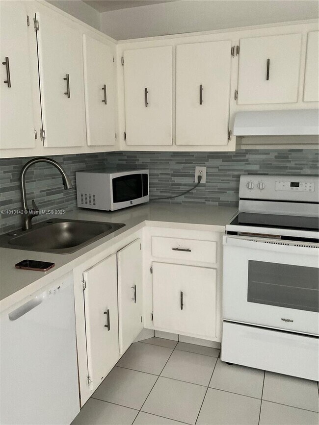Building Photo - 9273 Collins Ave
