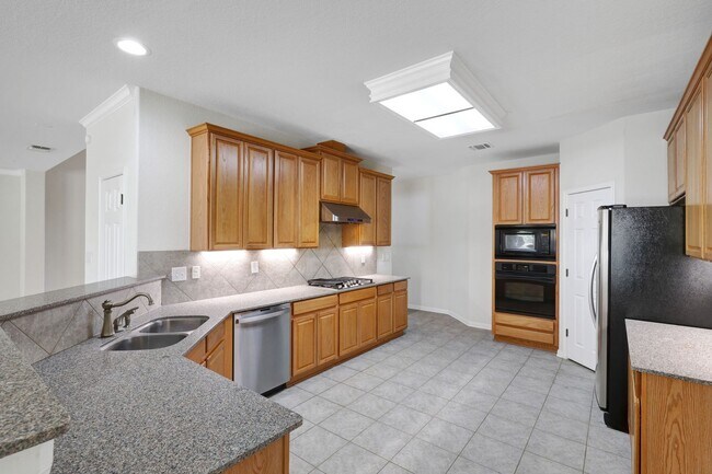 Building Photo - ***APPLICATION CURRENTLY UNDER REVIEW***Spacious & Stylish Living in a Premier Gated Community