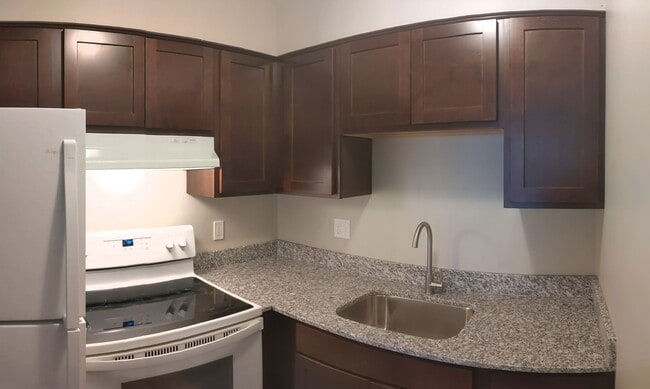 Building Photo - Conveniently located Riverbend Apartments feature a quiet community with a large green space