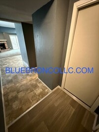 Building Photo - Updated unit with fresh paint and modern finishes!