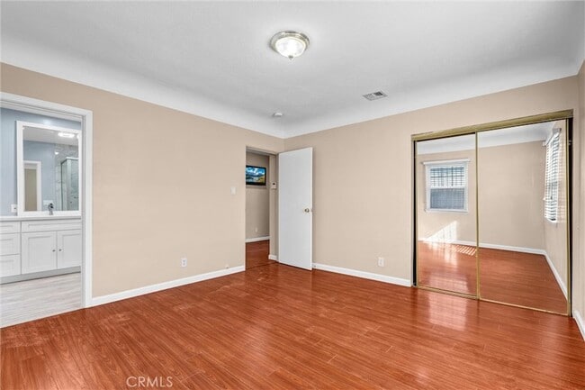 Building Photo - 9807 S Denker Ave