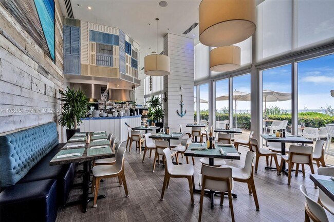 Building Photo - 15811 Collins Ave