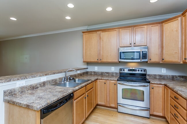 Building Photo - Beautiful 3-Bedroom Brookwood Townhome with 2-Car Garage — Don't Delay!