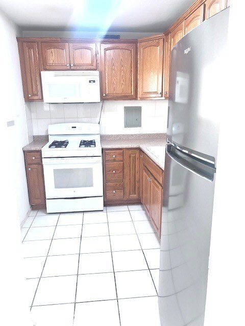 Building Photo - 1450 E 55th Pl