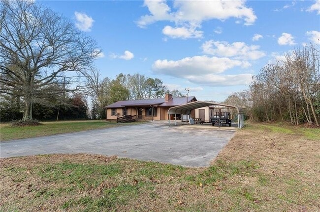 Building Photo - 3685 Settingdown Rd
