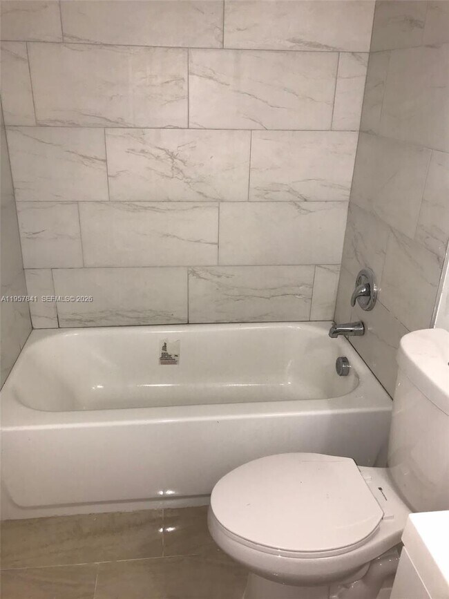 Building Photo - 8550 N Sherman Cir