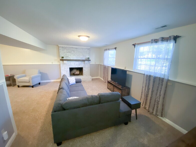 Lower level living room - 11423 Five Cedars Rd