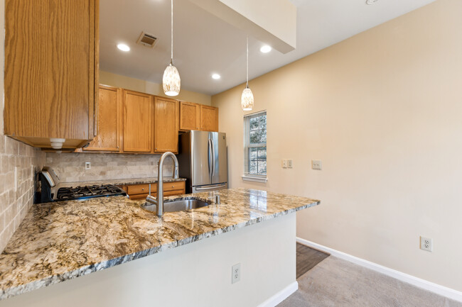 updated kitchen - 11326 Westbrook Mill Ln