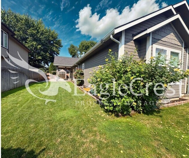 Building Photo - Contemporary Home With A Covered Patio & Quartz Countertops