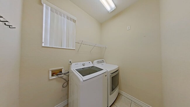 Building Photo - Spacious 6-Bedroom Pool Home with Open Floor Plan & Private Master Suite