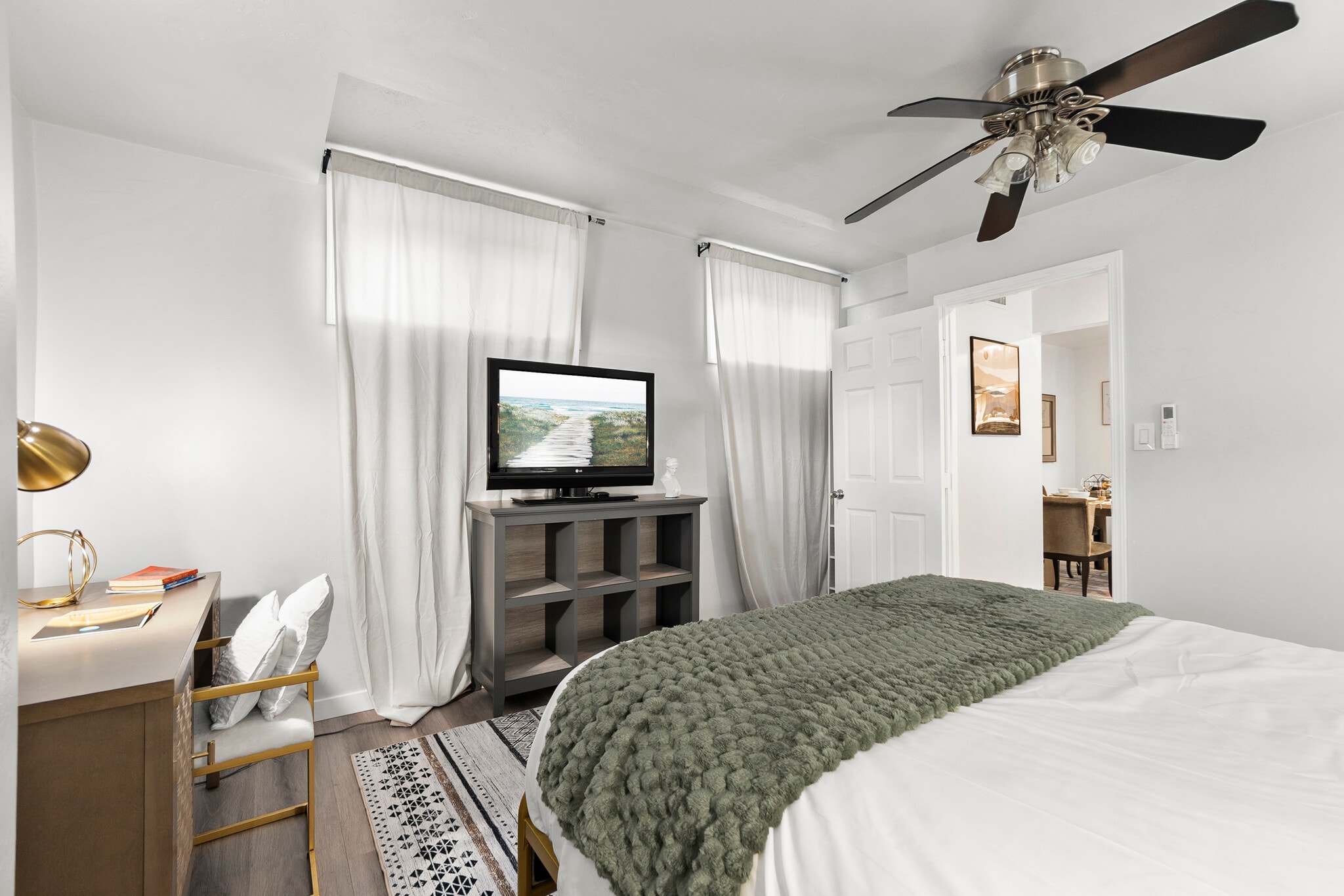 Balance work and comfort! This bedroom has a workspace for your productivity - 4989 Randlett Dr