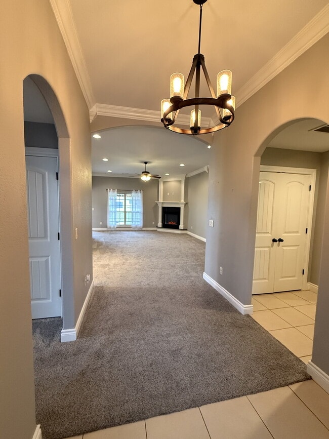 Building Photo - Great Outdoor Living Space / 4BR with 3 Ca...