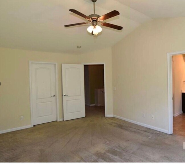 Building Photo - Townhome fresh paint and new carpet! Won't...