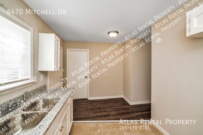 Building Photo - 6470 Mitchell Dr