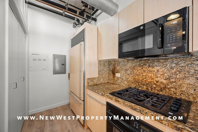 Building Photo - Expansive East Village loft at Parkloft, a...