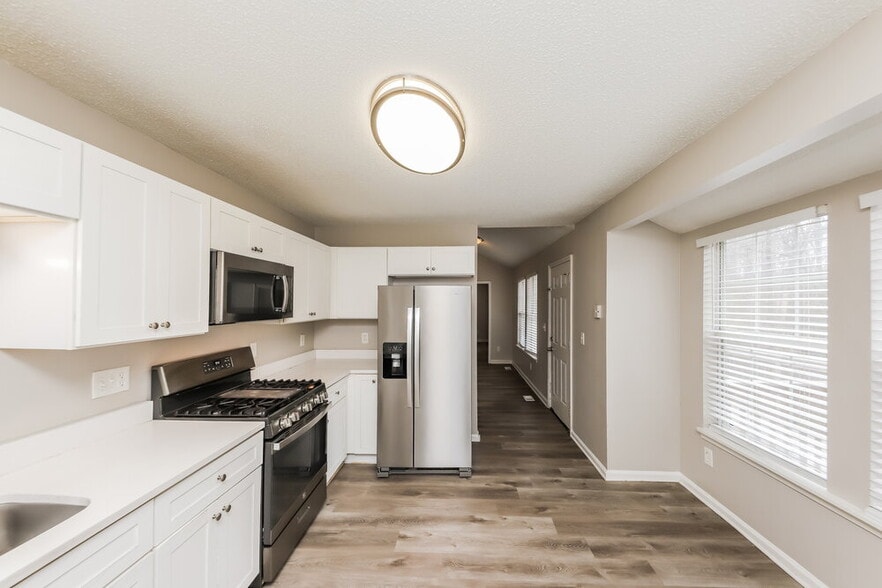 Building Photo - 6953 Cave Springs Rd