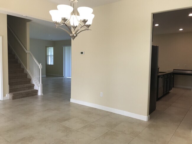 Building Photo - 7 BEDROOM 4 BATH AT INDEPENDENCE WINTER GARDEN POND VIEW NO REAR NEIGHBOR