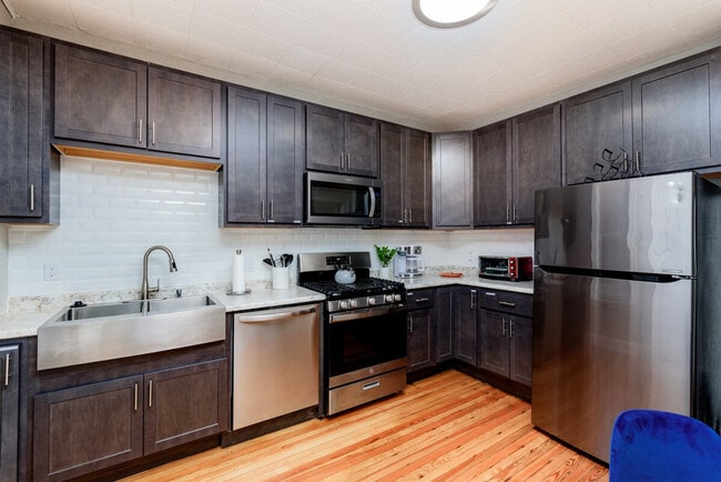 Building Photo - 3956 Tholozan Ave