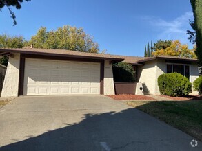 Building Photo - Remodeled 4 Bedroom 2 Bathroom Home with Yard